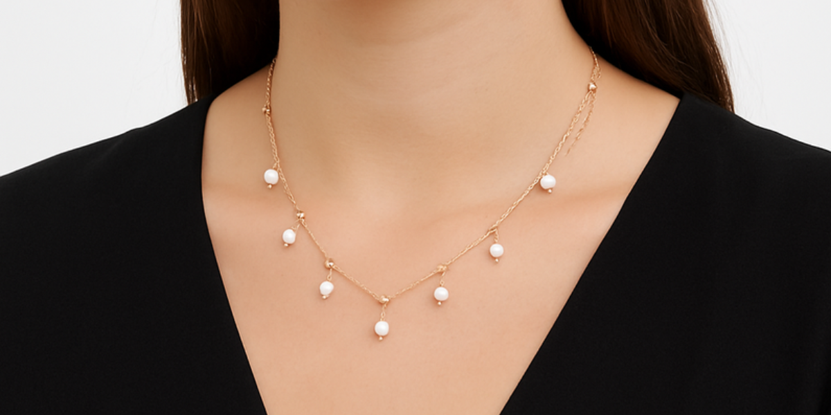 Gold necklace on model
